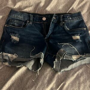 dark blue jean shorts. bust is a 25. from blanknyc.
